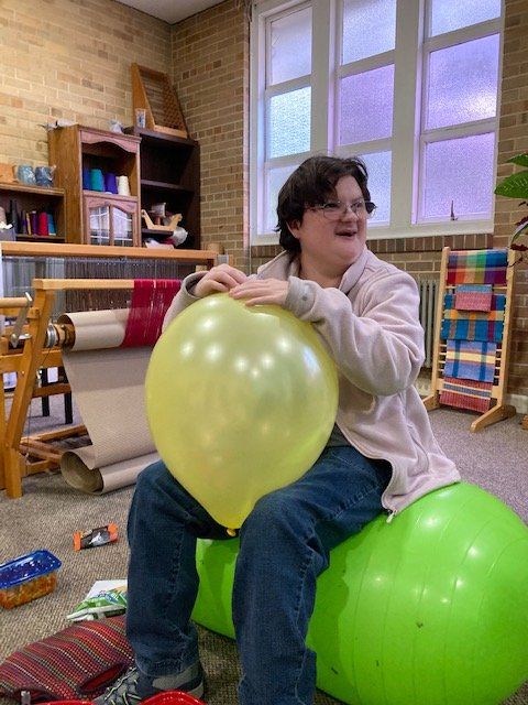 A client enjoys a balloon